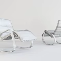 Two Modern Lounge Chairs With White Padded Seats And Wooden Curved Rocking Frames