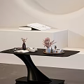 Modern Black Coffee Table With Curved Base And Tray Vase Flowers In Minimalist Interior