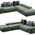 Green Velvet Sectional Sofa With Modular Design And Patterned Decorative Pillows 3d model