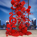 Floral Art Installation with Red Flowers Red Spheres 2025 Number Design and City Night View