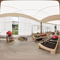 Bright Pilates Studio Interior With Wooden Reformers Red Exercise Balls And Cadillac Frames