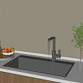 Kitchen Sink With Black Faucet Dripping Water Fruit Tray Drinks And Potted Plant White Countertop