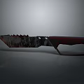 Rusty Serrated Blade Knife With Red Handle And Hole Design