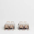 Stylish Modern Dining Table Set With Linen Tablecloth And Wooden Chairs And Tableware