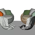 Gray And Wicker Round Single Sofa With Colorful Cushions And Soft Blanket