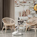 Two Woven Rattan Chairs With Small White Table In Living Room And Patterned Wallpaper Floor Lamp