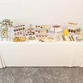 Elegant Dessert Table With White Tablecloth Decorative Flowers And Assorted Sweet Treats