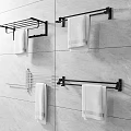 Modern Bathroom Accessories Towel Racks With White Towels On Gray Tiled Walls