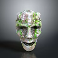 Mystical Stone Mask Depicting Ancient Character With Moss Covered Creature Features And Weathered Texture