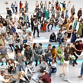 Large Diverse Group of People Interacting in Open Space with Various Poses
