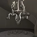 Silver Spherical Chandelier Hanging Beside Spiral Staircase With Gray Wall and Scattered Spherical Ornaments