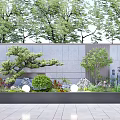 Modern Courtyard Garden Design With Gray Stone Wall Pine Tree Bushes And Round Lights