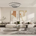 Modern Living And Dining Area Interior With White Sofa Circular Pendant Lights And Abstract Paintings