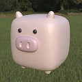 Cute Pink Square Pig Stuffed Toy Standing On Green Grass Field