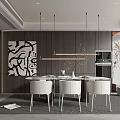 Modern Restaurant Interior With Round Dining Table White Chairs Black Artwork Pendant Lights And Green Plants
