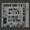 Neatly Arranged Various Colored Cars in Spacious Outdoor Parking Lot Area