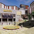 Modern Commercial Architecture With Glass Facade Stone Exterior And Outdoor Dining Area