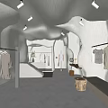 Modern Clothing Store Interior Featuring White Textured Walls Irregular Shapes Hanging Clothes and Mannequins