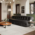 Vintage Black Leather Sofa And Round Wood Coffee Table Set For Cozy Retro Living Room