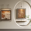 Abstract Paintings Hanging on Wall in Modern Interior With Circular Archway and Green Plant