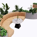 Outdoor Curved Landscape Seating with Lush Green Plants and Round Table