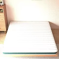 Cozy White Striped Mattress With Green Edge In Bedroom With Wooden Cabinet And Natural Light