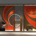 Modern Shop Window Featuring Orange Red Gray Curved Patterns Yellow Grapes And Wine Bottles