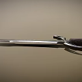 Ancient Handcrafted Sword With Intricate Engraved Blade And Decorated Hilt