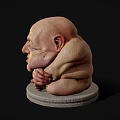 Fantasy Creature Sculpture with Large Head Wrinkled Face and Clawed Hands on Stone Base
