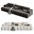 Modern Three Seater Sofa in Gray and White with Plush Pillows and Blanket