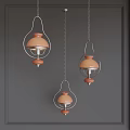 Modern Orange Pendant Lights with Metal Frames Hanging on Chains Against Grey Wall 3d model
