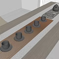 Modern Minimalist Tea Set Arrangement With Black Teacups And Teapot On Wooden Table
