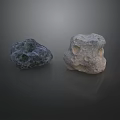 Two Rockery Stones With Dark Gray And Light Beige Colors On Dark Background
