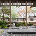 Japanese Courtyard Garden With Wooden Structure Latticed Fence Green Plants Stones Pebble Ground And Lanterns