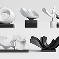 Modern Abstract Sculptures Featuring White Black Curved Geometric Shapes And Bases