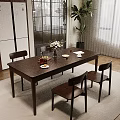 Dark Wooden Dining Table Set with Chairs Flowers Plates Cups and Plant