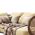 Beige Sectional Sofa With Rattan Armrests Wooden Legs And Decorative Pillows