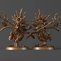 Two Bronze Mythical Creature Sculptures With Intricate Horns Wings And Circular Bases