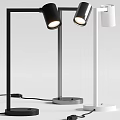 Modern Table Lamp With Adjustable Black White Heads And Sleek Metal Base