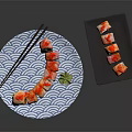 Sliced Sushi Rolls On Blue White Wave Plate With Chopsticks Wasabi And Black Plate Roll