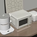 Modern White Kitchen Appliances Including Steamer Microwave And Rice Cooker On Wooden Countertop