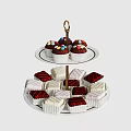 Two Tier Dessert Stand With Colorful Sprinkled Cupcakes And Square Pastries On White Plates