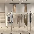 Elegant Hepburn Style Clothing Store Exterior With Window Displays And Mannequins