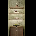 Modern Display Cabinet with Green Marble Backdrop Illuminated Shelves Decorative Fruit Bowl Photo Frame and Books