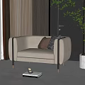 Modern Beige Single Sofa Interior Design With Metal Legs Decorative Pillows And Plant