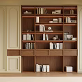Modern Built In Wooden Bookcase With Books Decorative Items And Frames Against Beige Paneled Walls