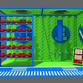 Interactive Zone Featuring Blue Green Enclosure Red Balls on Shelves and WOW Sign