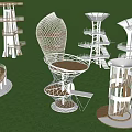Modern Designed Towers With Spiral Structures And Openwork Designs On Green Grassy Field