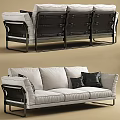 Modern Three Seater Sofa With Light Gray Upholstery Black Pillows And Metal Frame