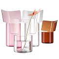 Modern Glass Vases in Pink Transparent Brown Colors with Fresh Flower Stem in Water
